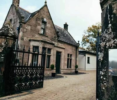 House School Road in Auchendennan