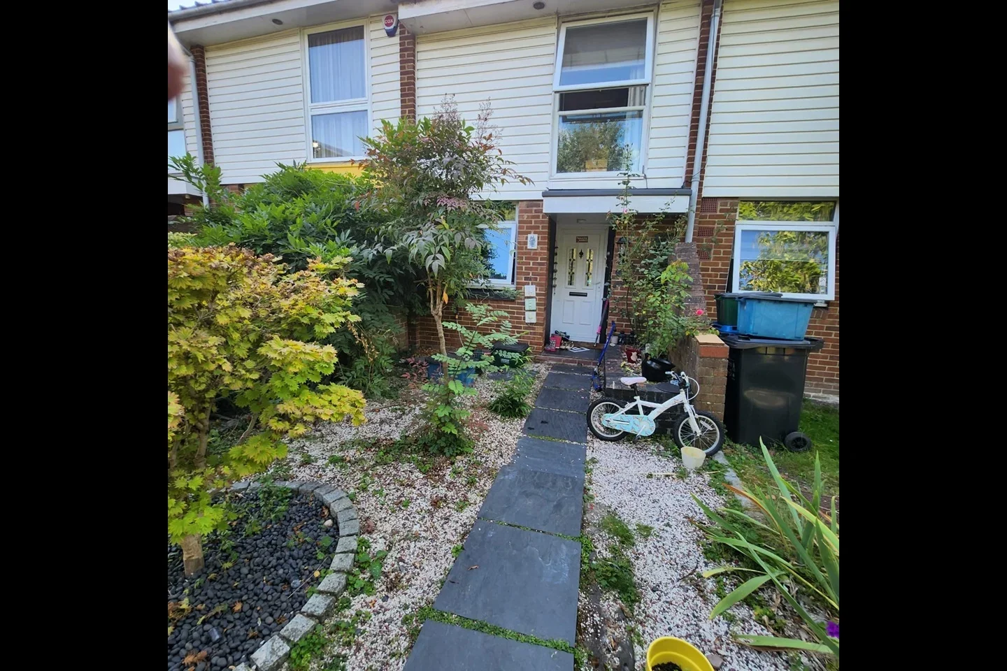 House Tidenham Gardens in Greater London